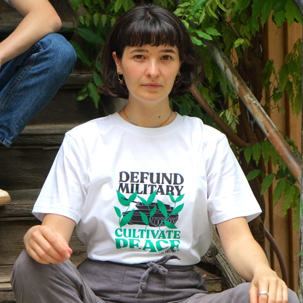 T-Shirt "Defund Military. Cultivate Peace"